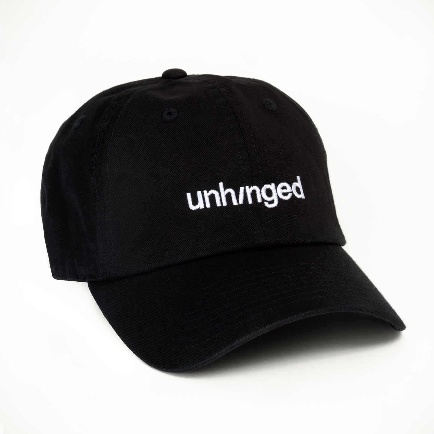 Black cap with 'unhinged' text on a white background